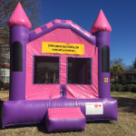 this is a inflatable pink and purple bounce house